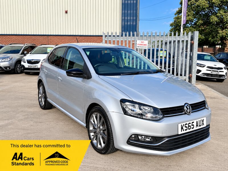 Silver Volkswagen Polo at the Dealership.png